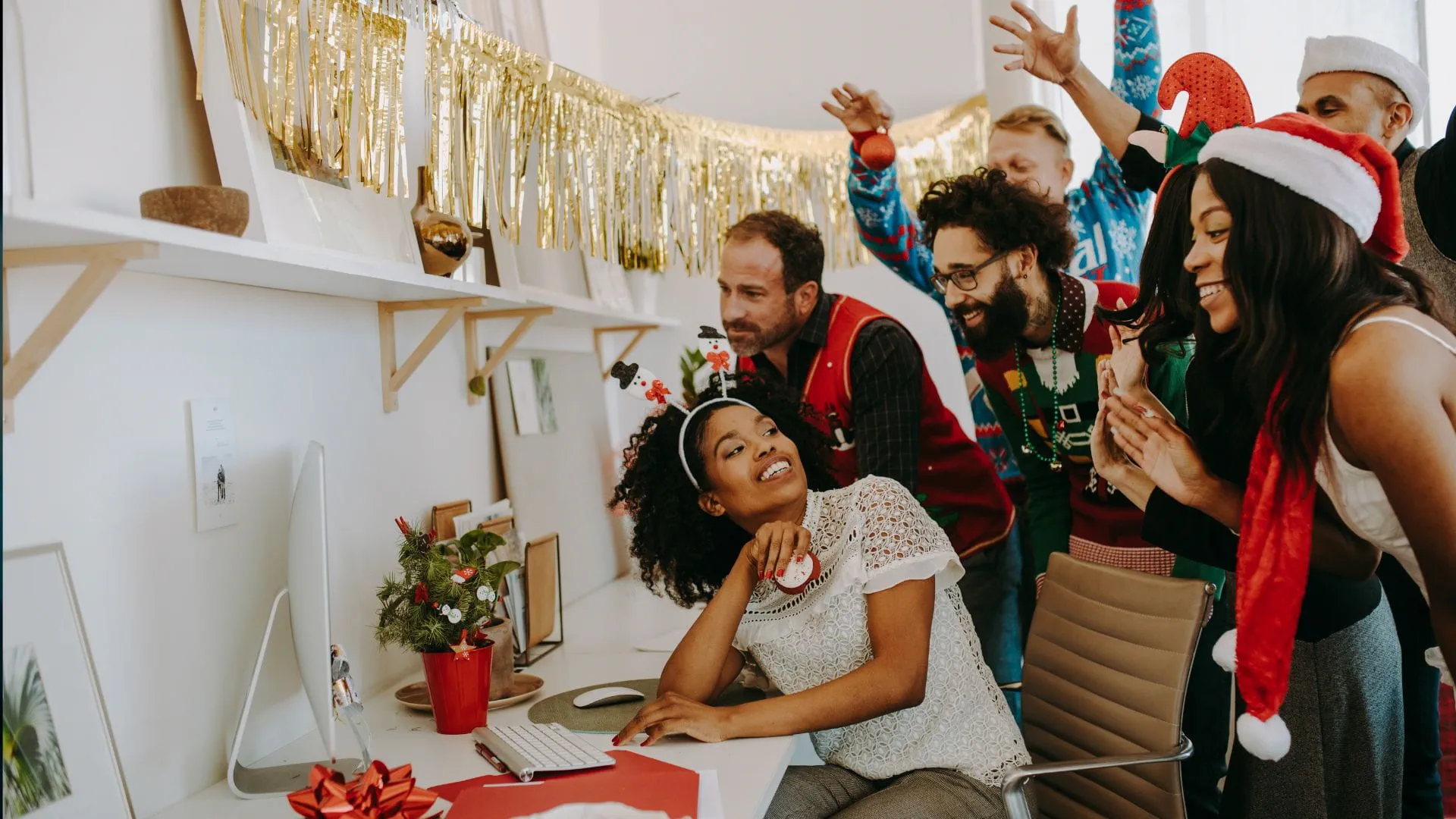 Professional people looking a computer for Christmas season