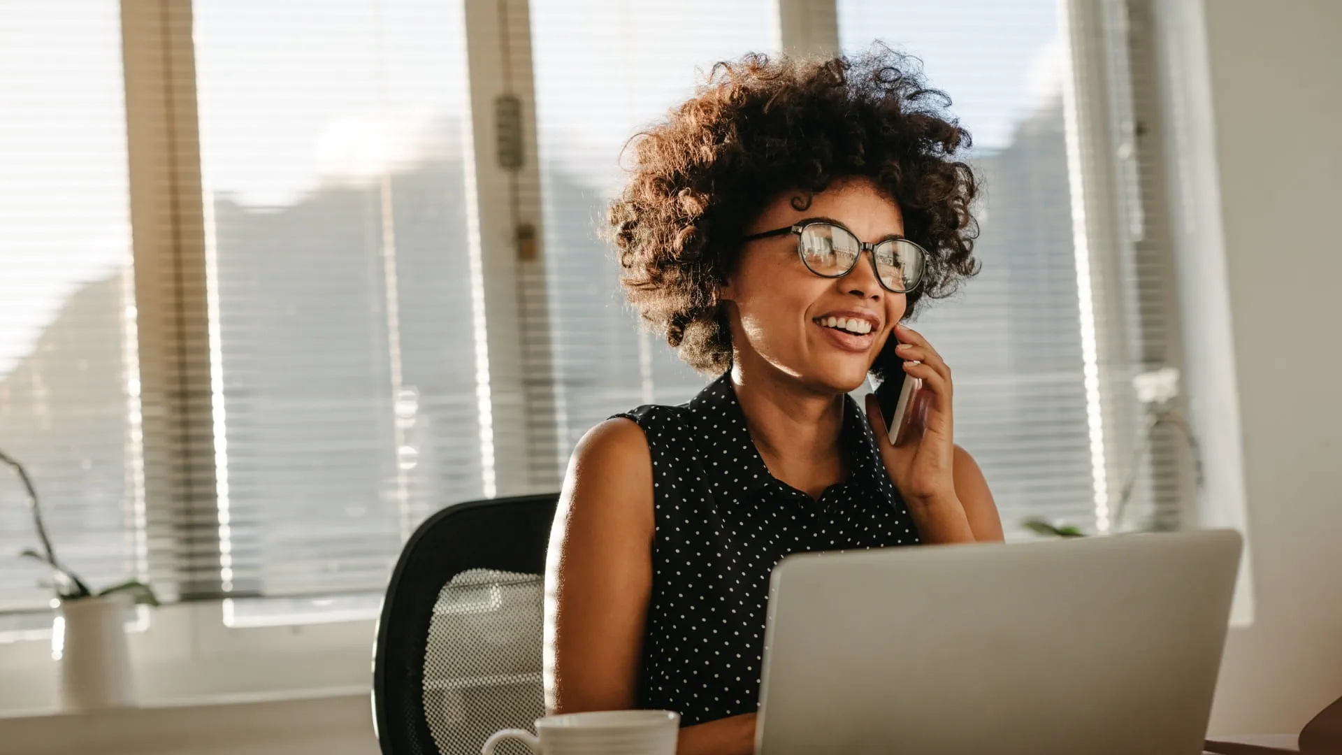 woman taking a phone interview
