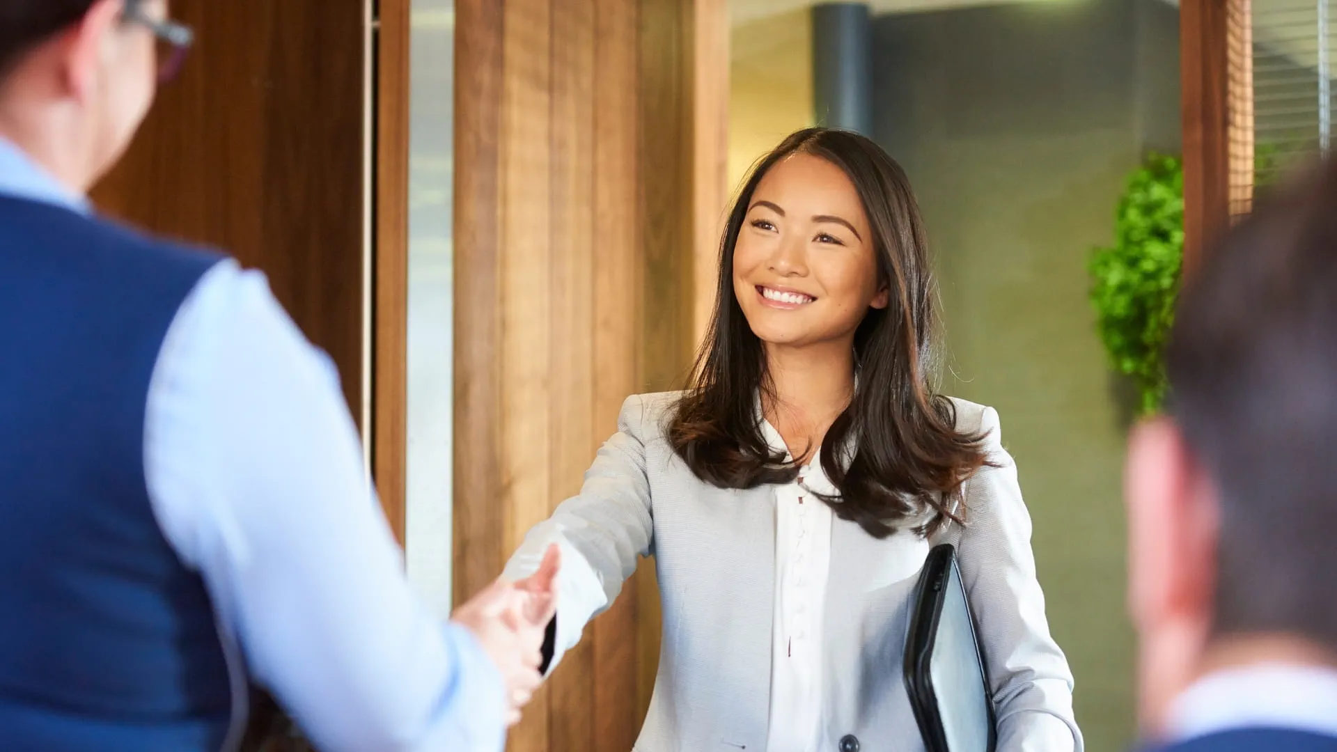 new grad greeting interviewer
