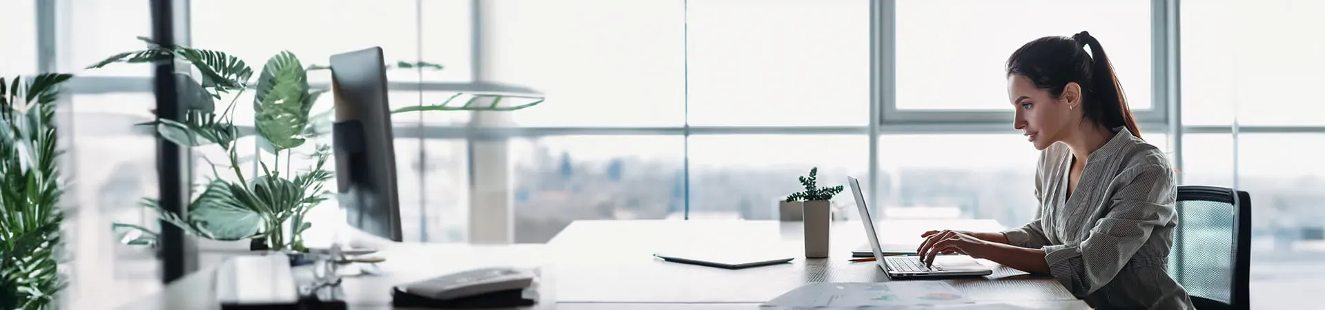 Professional woman participating in a business meeting Professional woman participating in a business meeting