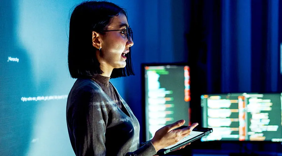 Person working with code on computer screen