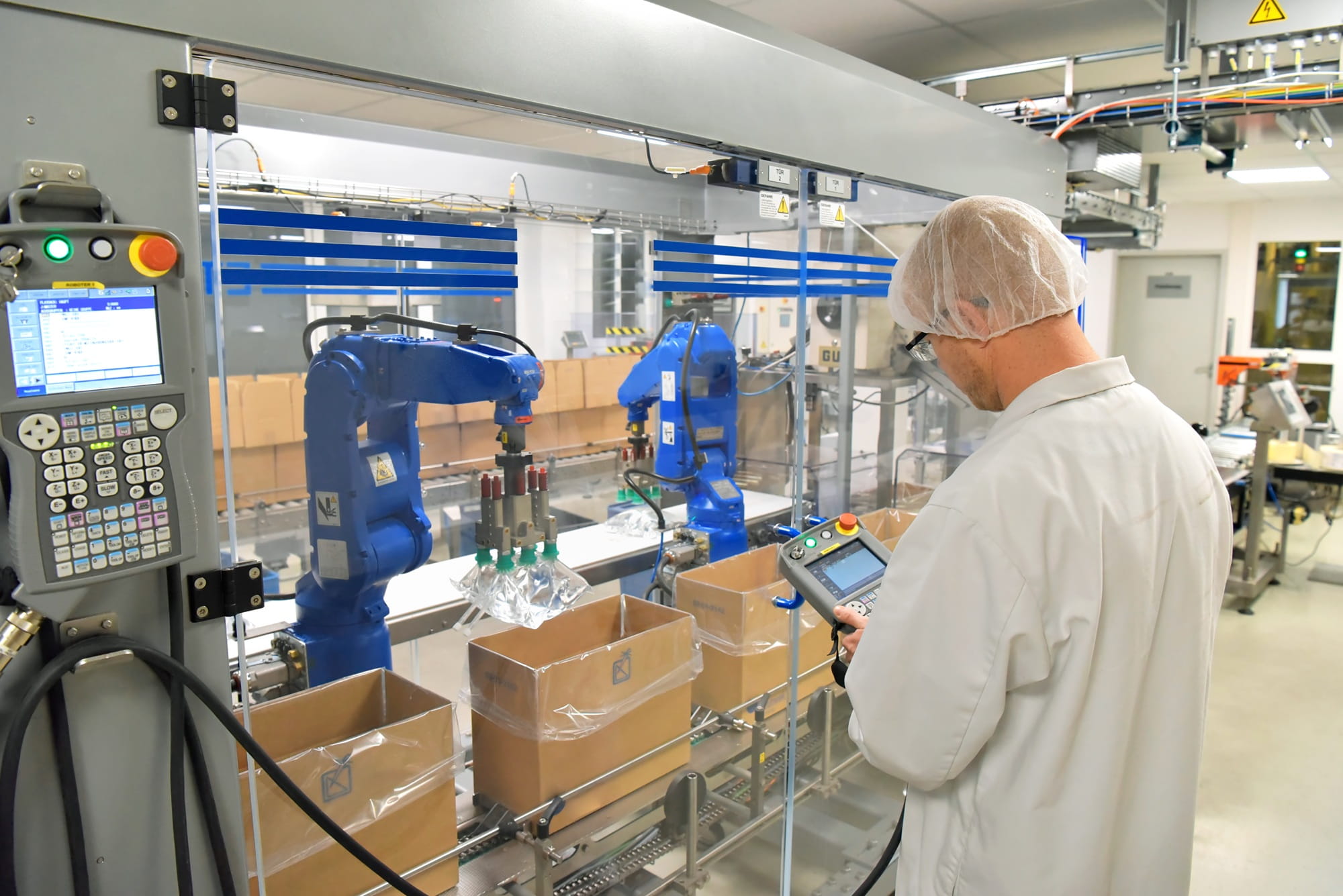 A warehouse for medical products where goods are being packed. A warehouse for medical products where goods are being packed.