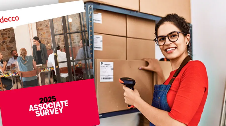 Person in a warehouse holding a barcode scanner with a red banner reading 2025 Associate Survey.
