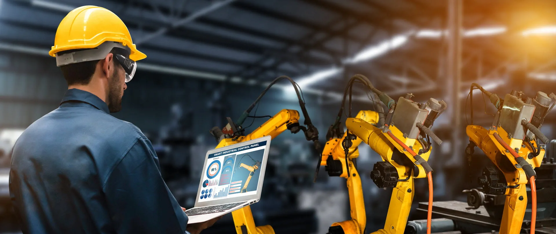 Worker using digital factory production technology showing automation manufacturing process 