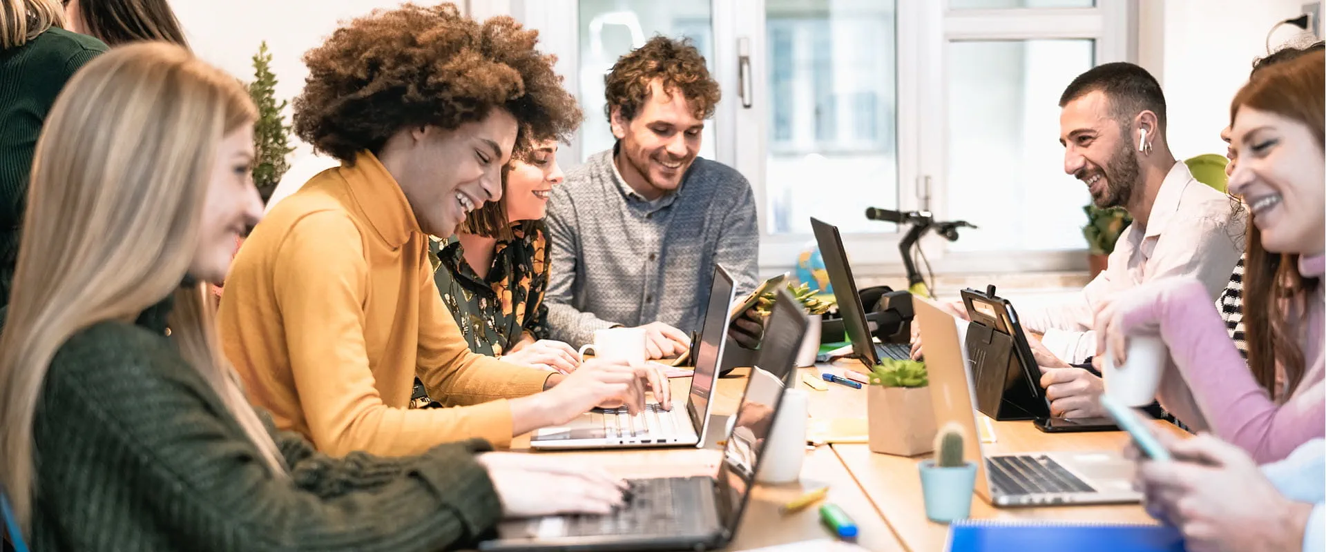 Young people in co-working creative space.
