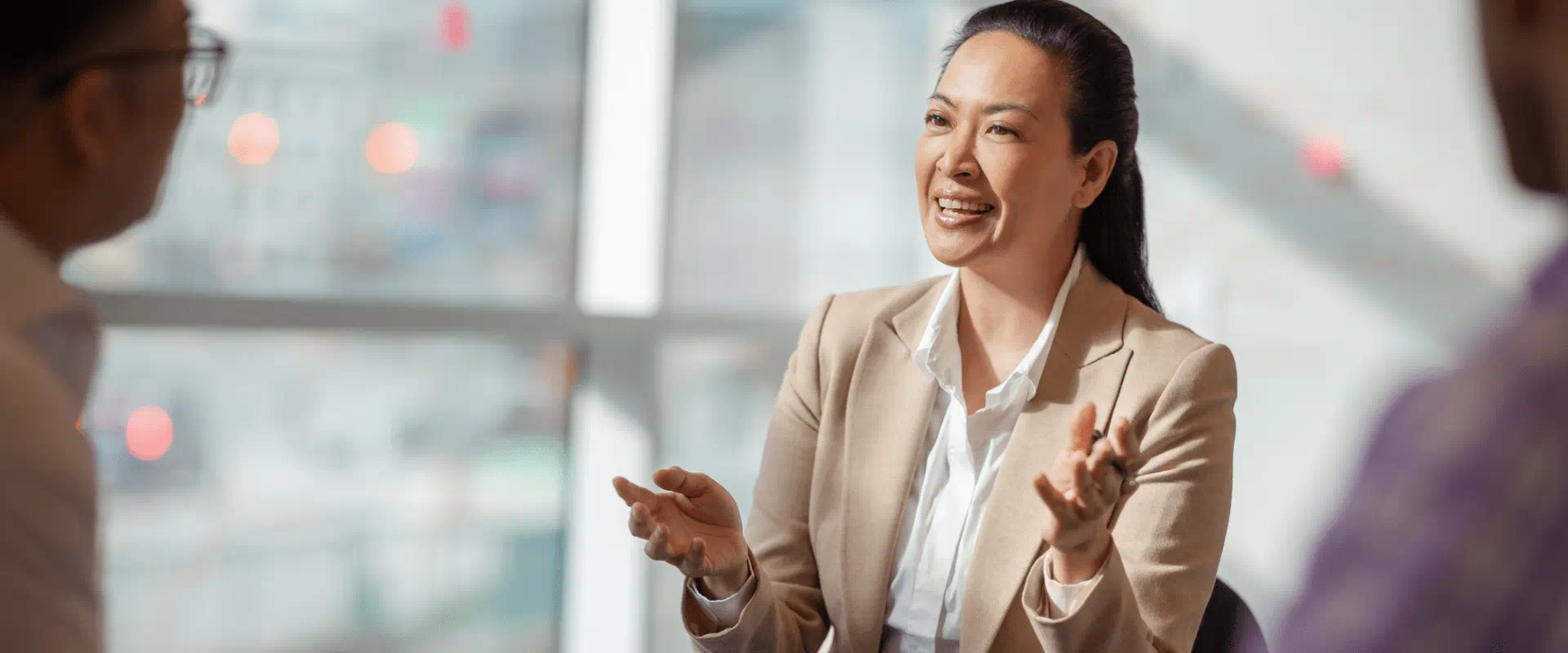 A job candidate talks to their two interviews
