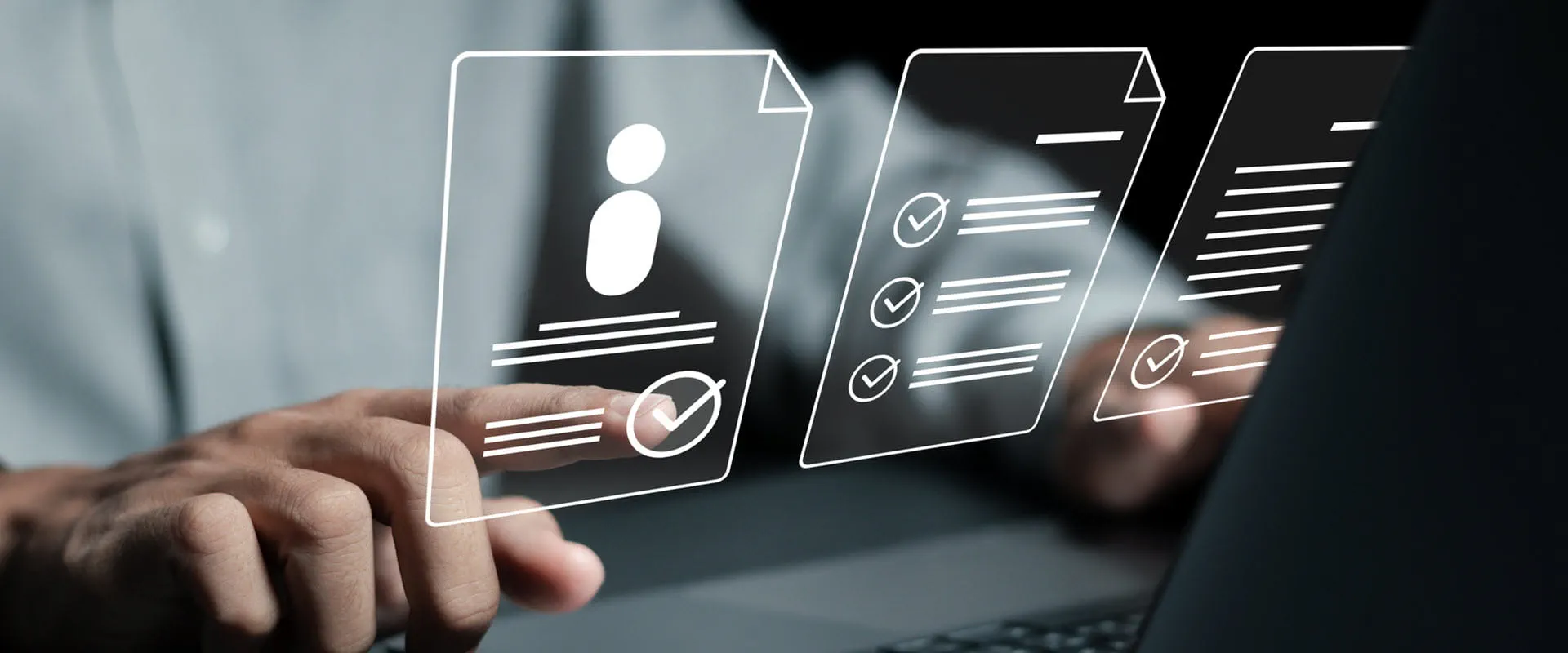 Hands and a laptop, with data graphic overlays.