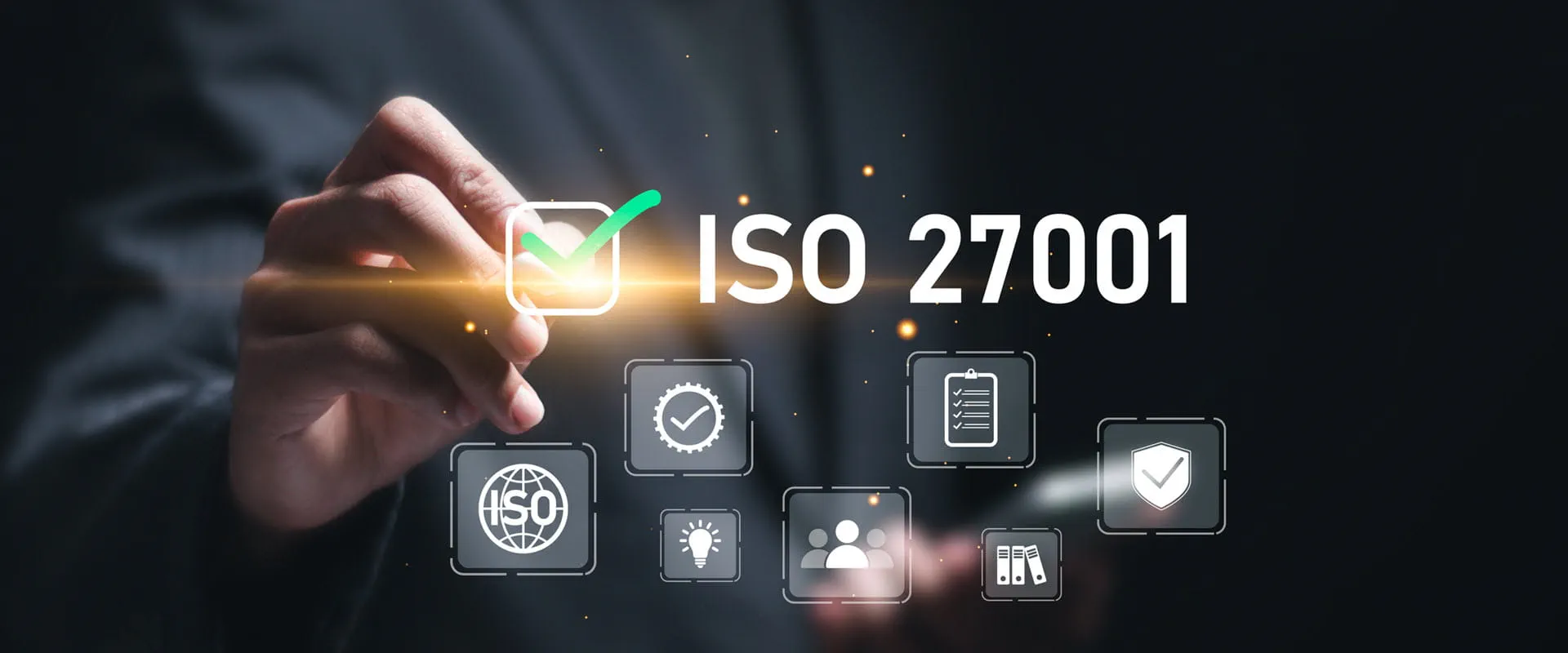 Hand pointing towards a glowing checkmark symbol next to the text 'ISO 27001,' representing information security certification.