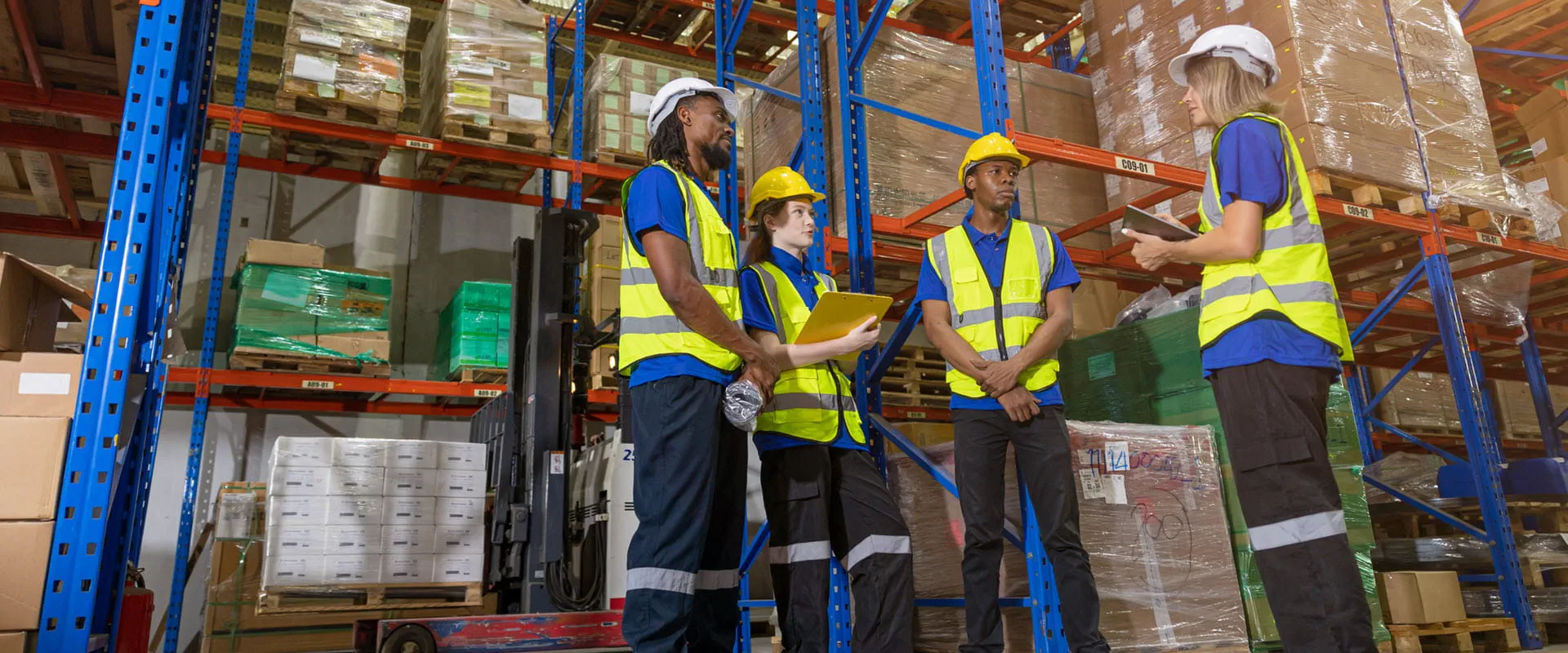 Group of people worker in warehouse cargo storage meeting talking together work discussion with foreman manager